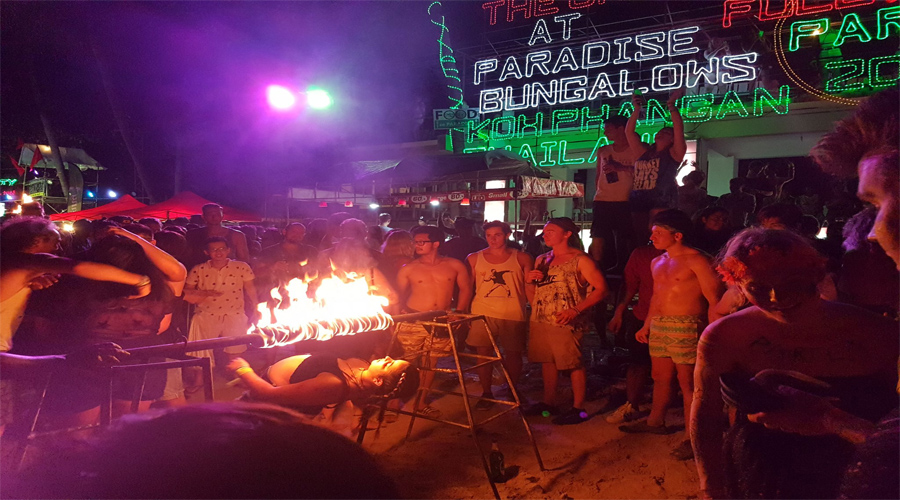 Fire rope jumping and fire limboing